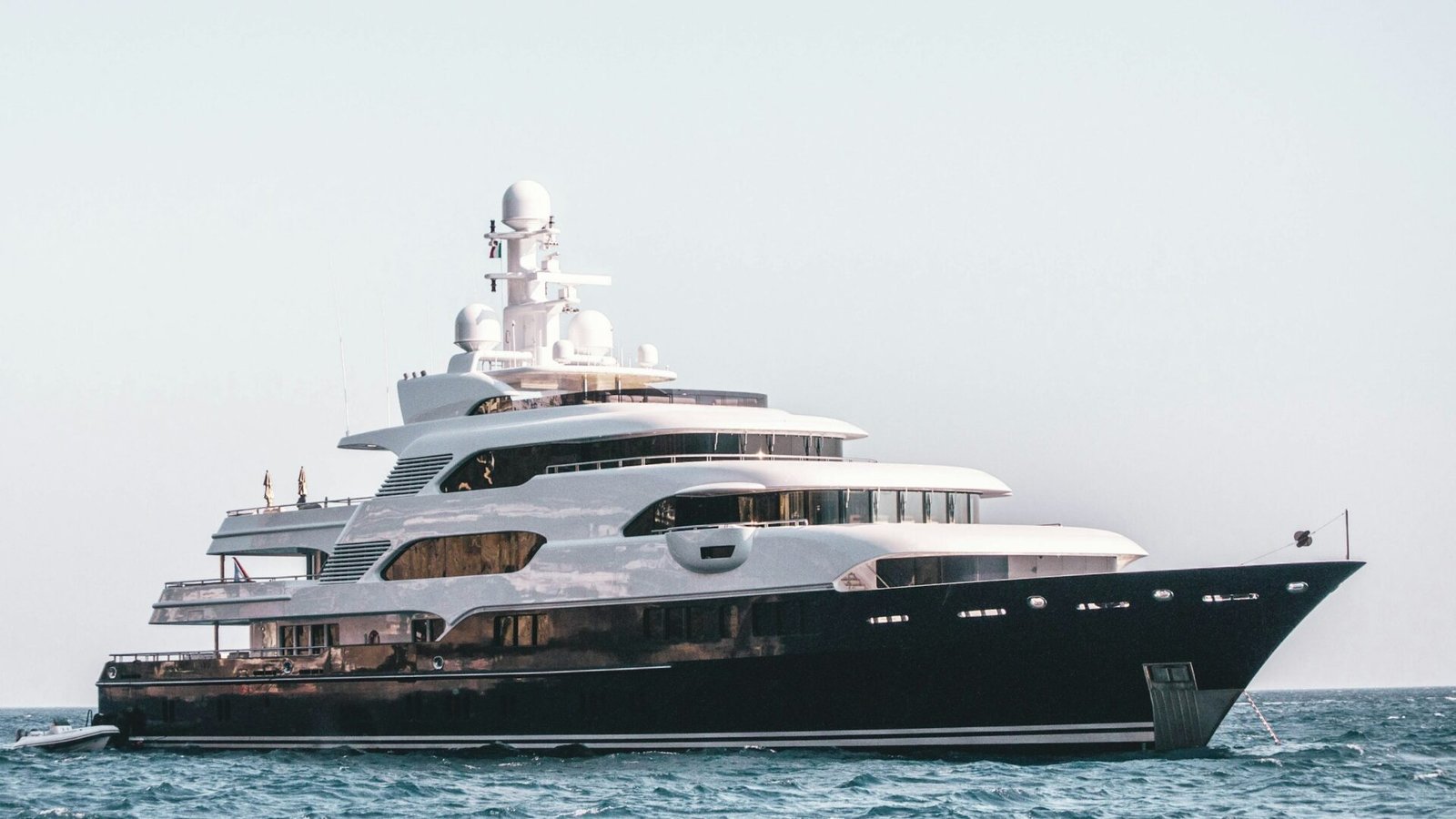 White and black cruise ship at sea