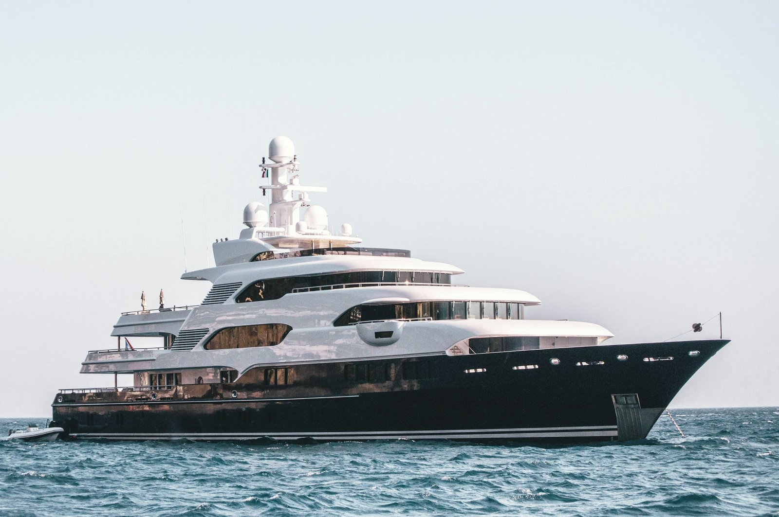 White and black cruise ship at sea